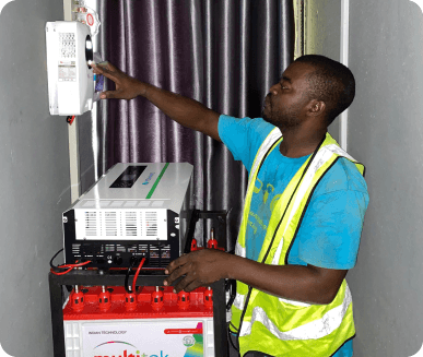 An electrician installing an inverter